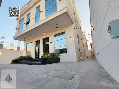 Villa for sale with a stone façade, located behind the park.