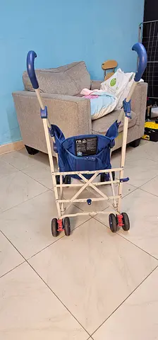 Lightweight foldable baby stroller in good condition 25AED