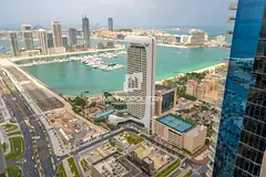 Mid-Floor | Multiple Cheques | Partial Palm View