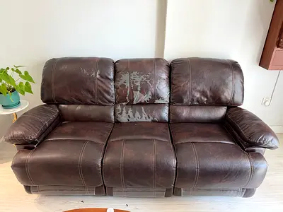 Brown 3-seater leather recliner sofa (worn upholstery)