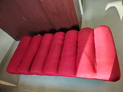 Red Upholstered Armless Chaise/Daybed - Good Condition