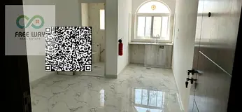 Studio for annual rent in Al-Aliya, Ajman; features a separate kitchen and is available for first-ti