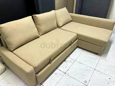Beige L-shaped Sofa bed with Storage - Good Condition