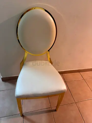 Set of 2 gold frame dining chairs with white faux leather seats