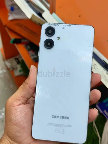 Samsung A06 phone - white, good working condition