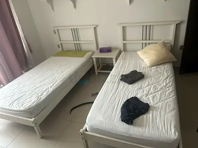 2 IKEA single bed with side table