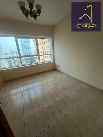"2-bedroom apartment with a hall in a very distinguished family building with free air conditioning, parking, gym, and
