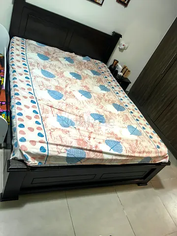 Solid dark wood double bed with side 2 table and 4 storage base - good condition with home box sprin