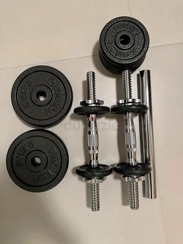 Pair of adjustable dumbbells with weight plates and bar (approx. 20kg total)