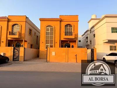 For sale in Al Muwaihat, Ajman: A villa featuring 5 master bedrooms, a majlis, a living area, a spa