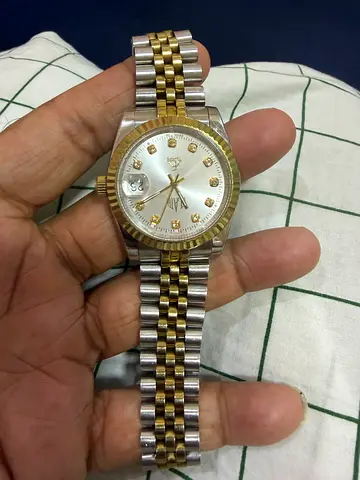 Two-tone men's wristwatch with date and jubilee bracelet