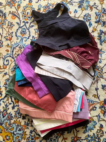 Bundle of women's sports bras - various style and colors, gently used, size medium