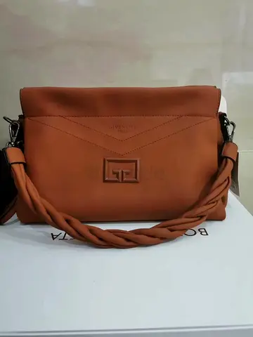 Brown leather shoulder bag with braided strap