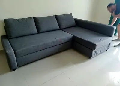 Grey L-shaped Fabric Sofa bed with Chaise -Good Condition