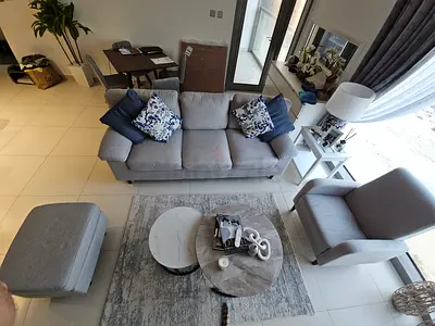 Light grey 3-seater sofa with armchair and ottoman - good condition