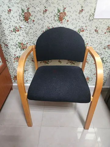 Solid wooden frame office/guest chair with black fabric seat and back