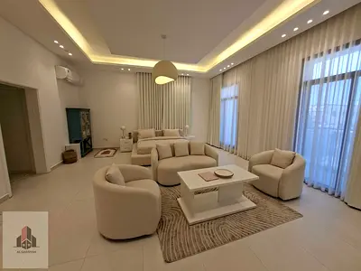 A luxury villa in Al Muwaihat 2, featuring five rooms. The price includes furniture, utilities (electricity and water), and air conditioning. The prop
