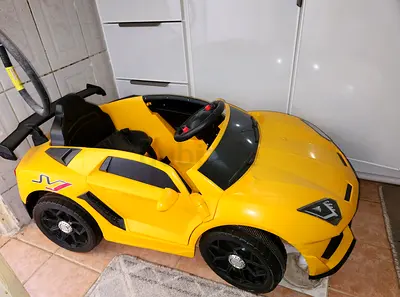 Yellow Electric Ride-On Car for Kids — Single Seat, Good Condition