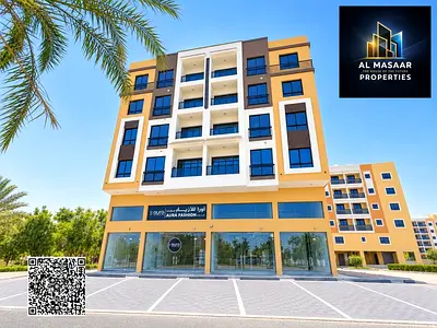 Investment opportunity: Building for sale in Al Tallah 2, located on Academy Street. It comprises a ground floor, a mezzanine, and four upper floors,