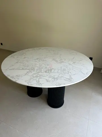 Round Marble Dining Table with Black Pillar Base