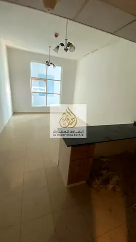 with parking 🔥 Excellent Price in Al Nuaimiya 3 | 1 Bedroom + Hall + 2 Bathrooms + Balcony | Directly on Khalifa Street | ! 🔑