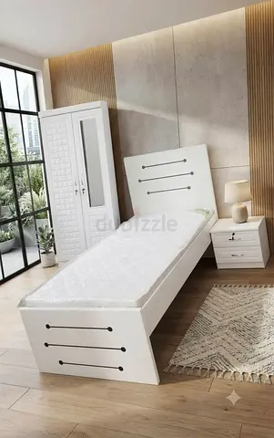 Brand new single size bed and two door Cabinet Available