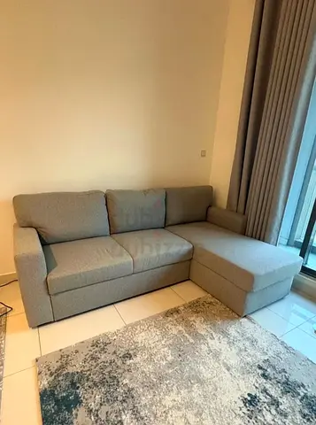 Light grey L-shaped sofa bed with chaise -IKEA BÅRSJÖV good condition