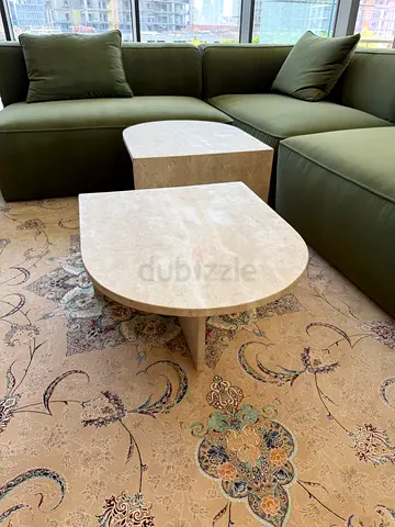Set of two natural travertine nesting coffee tables