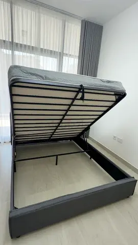 Gray fabric bed with storage plus the  mattress