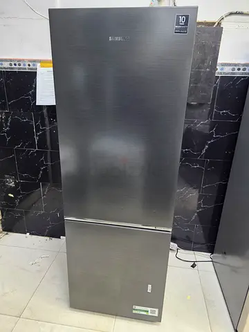 Samsung bottom fridge and freezer new model slightly used