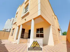 Villa for annual rent in Al Zahya, Ajman, featuring 5 master bedrooms, a majlis, spacious living roo