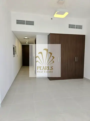Studio for Annual Rent in Ajmal City – Al Hamriyah | Spacious Layout | Swimming Pool + Gym + Garden + Beach | Central AC |