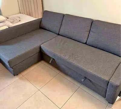 Grey L-shaped Sofa Bed - Good Condition