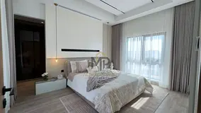 An upscale villa featuring a modern design, spacious interiors, and a practical layout ideal for lar