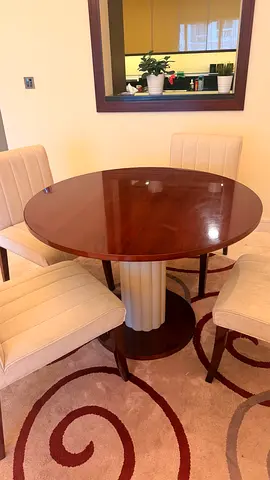 Elegant Round Dining Table – Dark Wood
