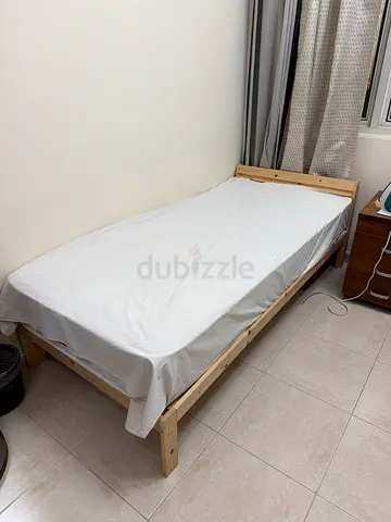 Single wooden bed frame with slatted base - good condition