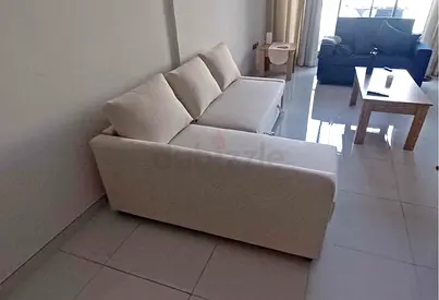 Light beige L-shaped sectional sofa bed  good condition