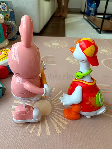 Battery-operated walking rabbit and duck toys - with music used, working