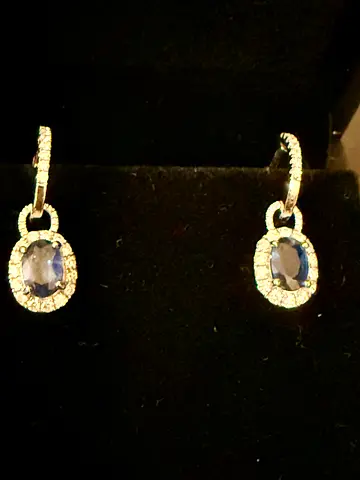 Elegant sapphire drop earrings with halo diamonds