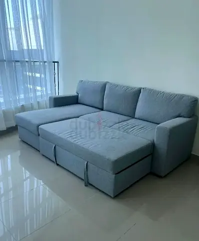 IKEA BÅRSJÖVLight grey L-shaped sofa bed with storage - good condition