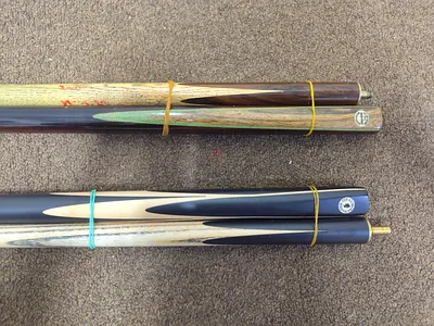 Two wooden Snooker/billiard cue sticks - joined shafts