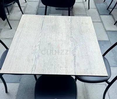 Square light-wood dining table top with metal base - good condition