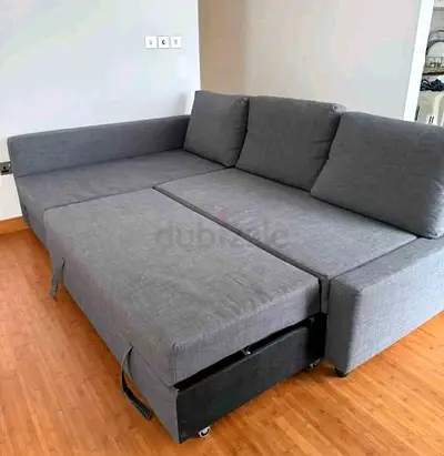 Grey L-shaped Sofa Bed with Storage - Good Condition