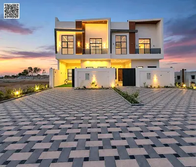 Luxury villa for sale in Al Helio 2 – Ajman | Includes electricity and water | Located on a main ro