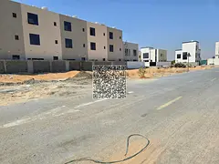 Residential/investment land for sale—suitable for villas or townhouses—in the Al Zahia area of 