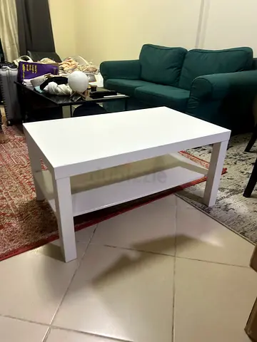 White rectangular coffee table with lower shelf - good condition (negotiable)