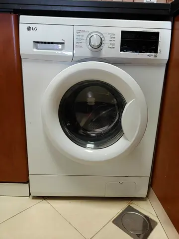 LG Front Load Washing Machine 7kg - Good Working Condition with warrenty