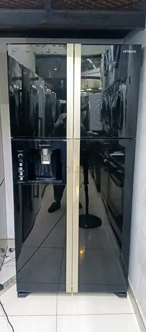 Hitachi black 4-door refrigerator with water dispenser - good condition working fre home delivery