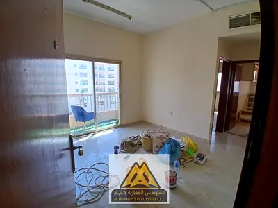 2 Bedrooms + Living Room at a Very Affordable Price | Al Rumaila 1 | Balcony | Central A/C | Prime Location