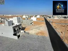 Residential plot for sale in a prime location in the Al Zahia area of Ajman; registration fees